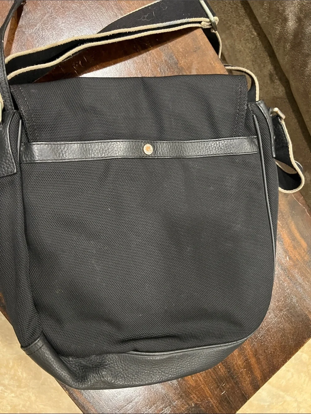 Lacoste Black Canvas Messenger Bag with Leather Trim. Lacoste shoulder/crossbody